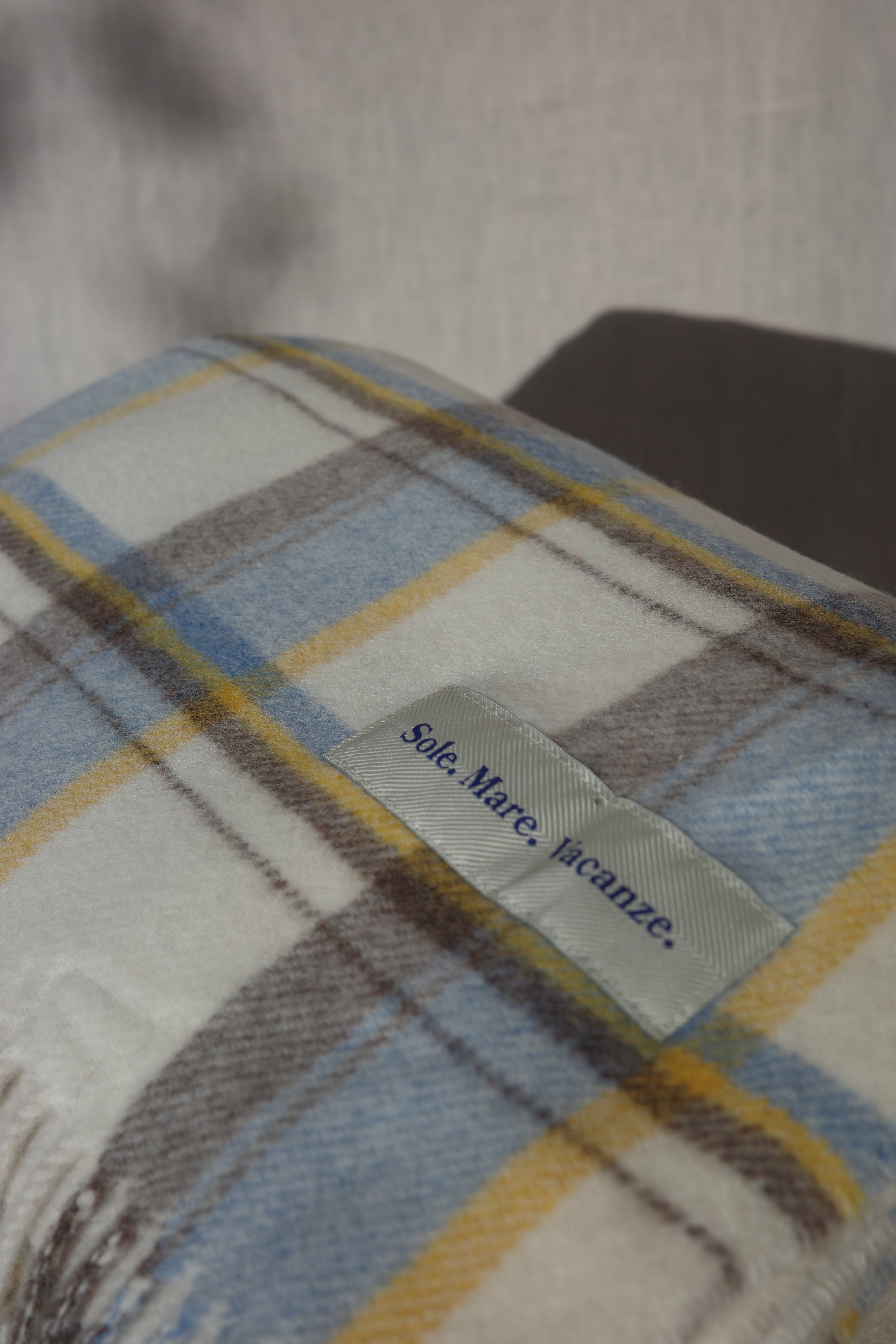 wool blanket, plaid blanket, Italian made blanket, natural wool, Mediterranean style, effortless elegance, timeless design, luxury home accessory.