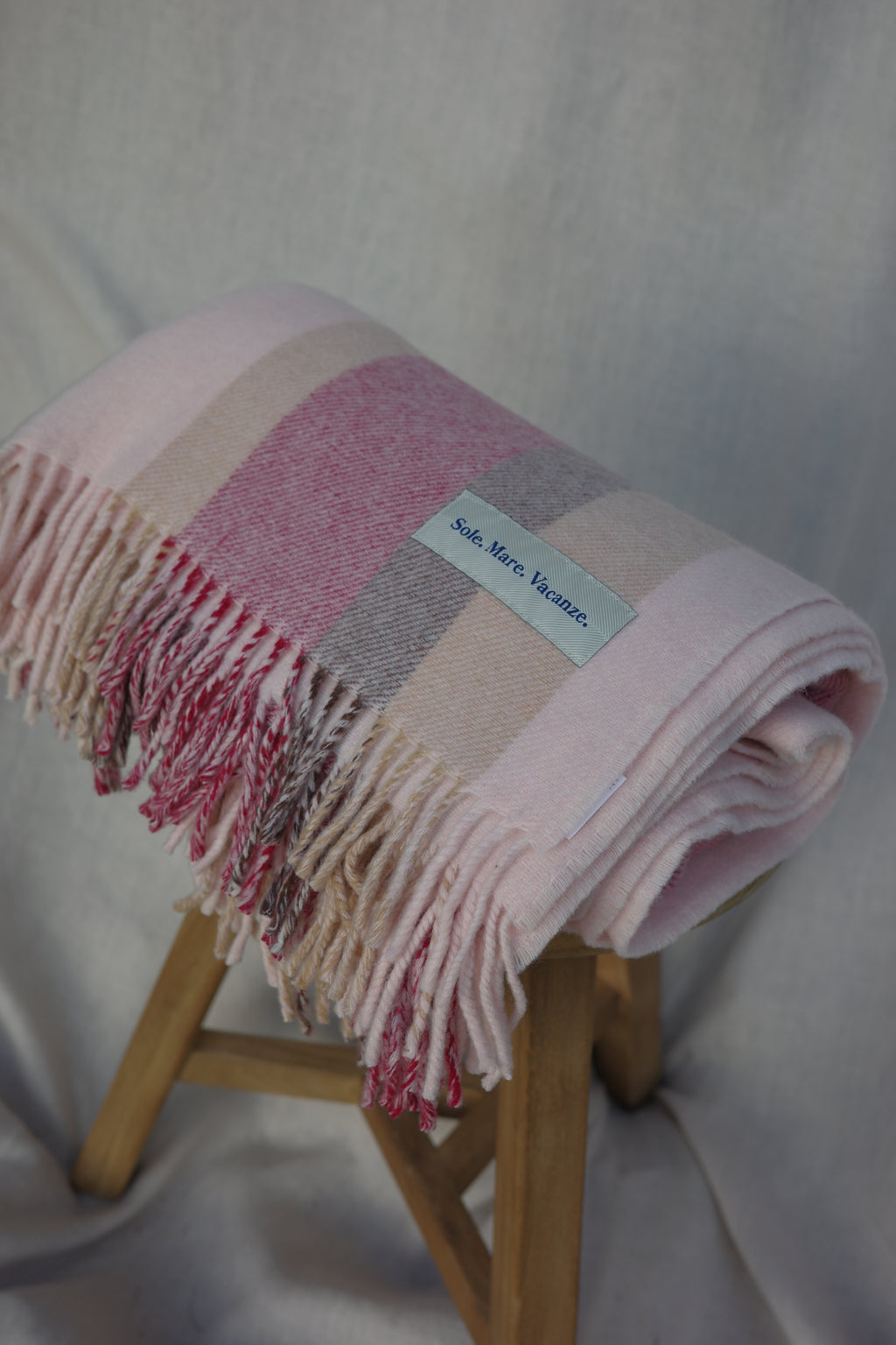 wool blanket, plaid blanket, Italian made blanket, natural wool, Mediterranean style, effortless elegance, timeless design, luxury home accessory.

Discover the timeless elegance of our wool plaid blanket – soft, warm, and handcrafted in Italy for effortless Mediterranean style.
