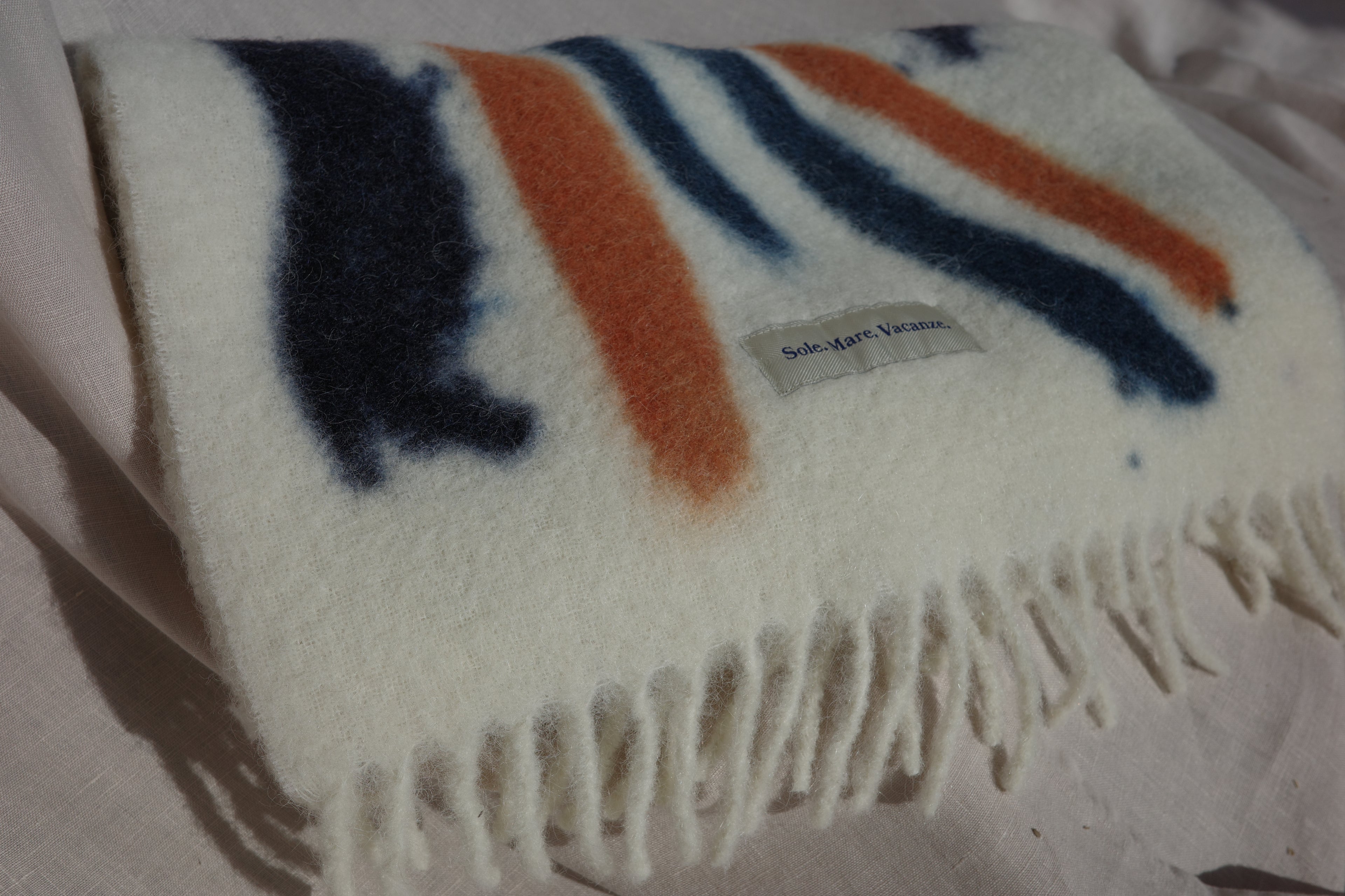 Sciarpa in alpaca Sole Mare Vacanze – morbida, calda e senza tempo. Realizzata in Italia con eleganza naturale.