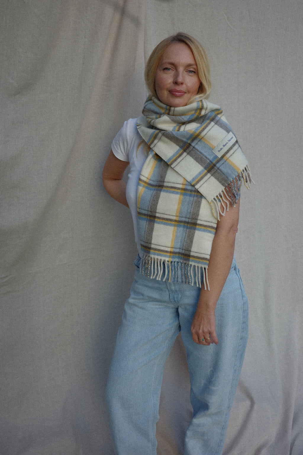 Luxurious virgin wool scarf by Sole Mare Vacanze – soft, warm, and timeless. Crafted in Italy with natural elegance.
