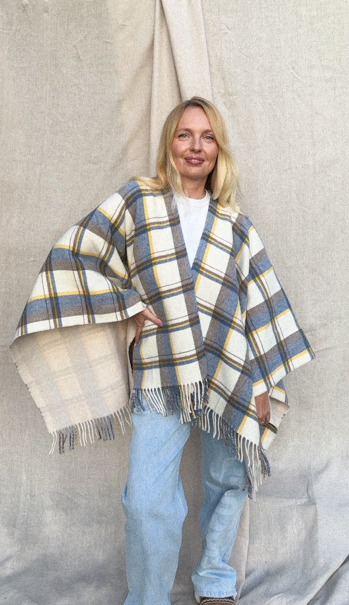 Wrap yourself in the ultimate luxury: our virgin wool poncho, a natural fibre accessory made in Italy for effortless Mediterranean elegance