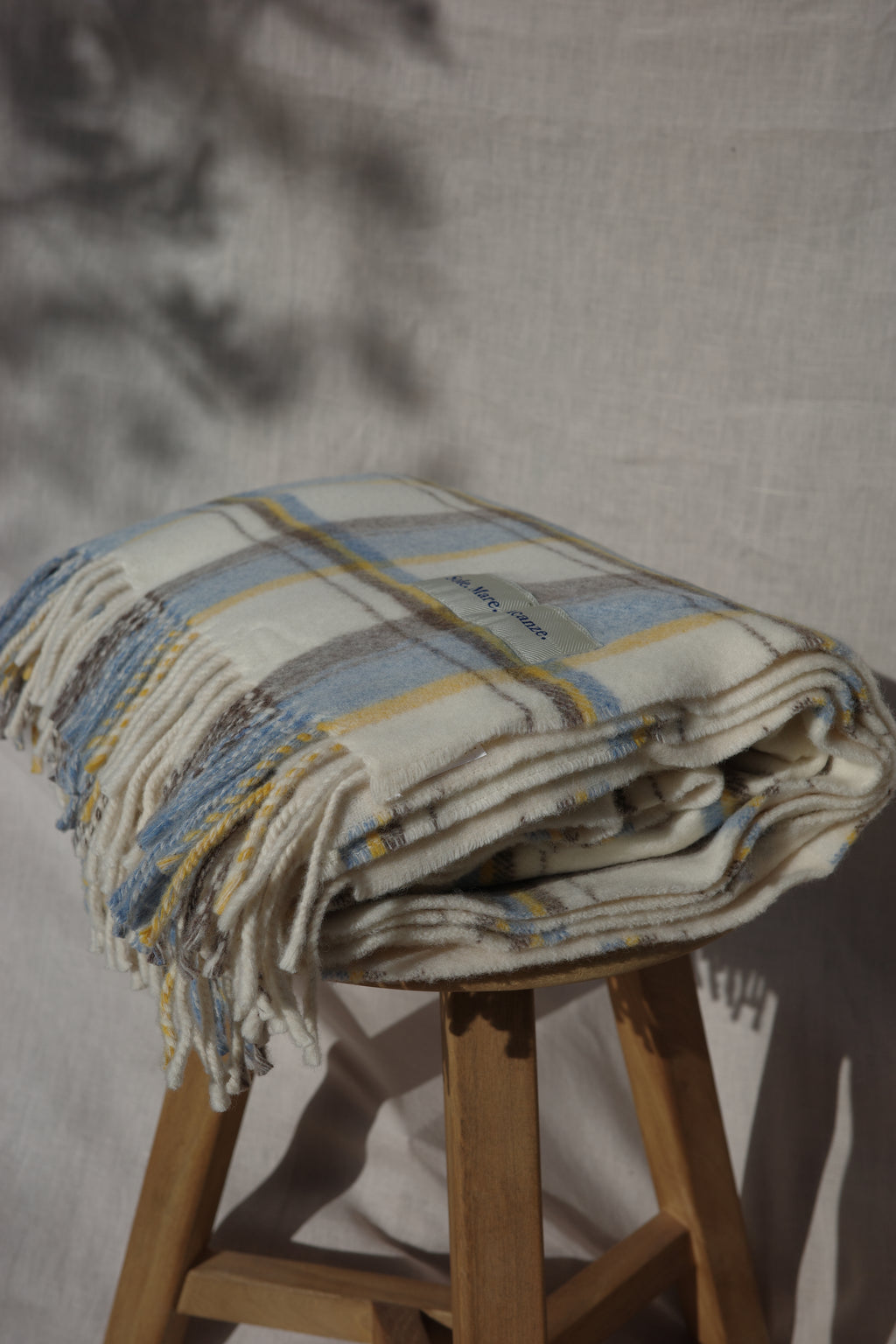 Wrap yourself in cozy Italian luxury with the Sole Mare Vacanze wool plaid blanket. Made from premium natural wool, it combines warmth, softness, and timeless design. The classic check pattern adds a touch of Mediterranean elegance, perfect for relaxing evenings, home interiors, or weekend getaways.
Each piece is crafted in Italy with attention to detail and love for natural fibres – a statement of effortless style and slow living.